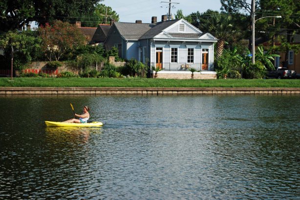 Away from the tourist infested center of the city some folks like to spend a few hours paddling in one of the cities many waters.